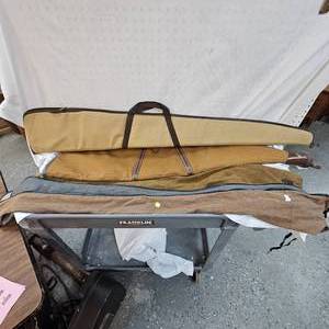 lot 77 image: Pair of Soft Shotgun Cases and 3 Gun Sleeves