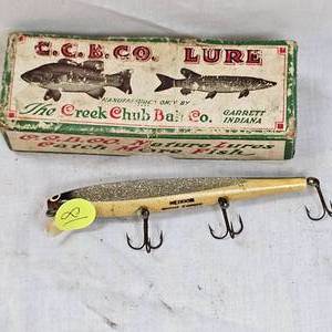 lot 81 image: Heddon Wooden Cobra Fishing Lue with Creek Chub BoxWinchester Tin Sign