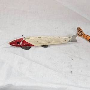 lot 103 image: Pfueger Fins Decoy and Custom 60s Hand Carved Decoy