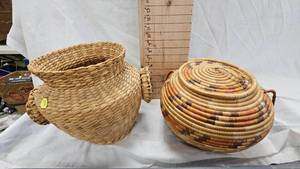 lot 226 image: 1950s Arizonia Navajo Wedding BasketEarly 20th Century Cane Loop Handle Basket