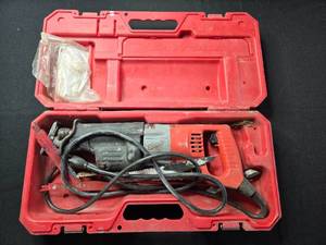 lot 11 image: Milwaukee Sawzall Reciprocating Saw with Case, Blades, and Manual