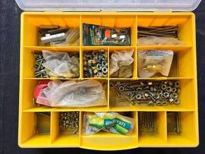 lot 29 image: Yellow Organizer Box with Assorted Nuts, Bolts, Screws and Hardware