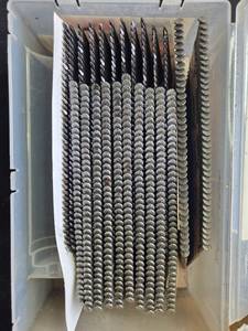 lot 31 image: Assorted Paslode RounDrive 30 Degree Nails and Industrial Staples