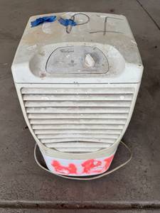 lot 58 image: Whirlpool Portable Dehumidifier with Adjustable Settings