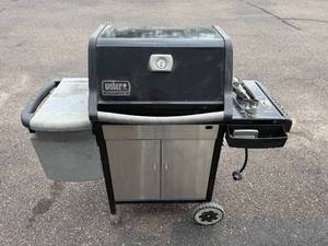 lot 61 image: Weber Genesis Silver Gas Grill with Side Burner and Cabinet Storage