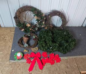 lot 109 image: Holiday Wreaths and Decorations Lot with Garland, Bows, and Tin