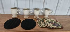 lot 117 image: Set of Cream Stoneware Mugs with Quilted Pot Holders and Trivets
