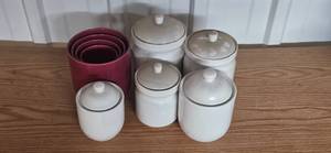 lot 122 image: Set of White Ceramic Canisters with Lids and Red Nesting Bowls