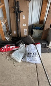 lot 272 image: Outdoor Event Supplies Lot with Flags, Metal Stakes, and Disposable Booties