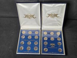 lot 25 image: 2008 and 2009 State Quarter Collection Sets in Display Cases