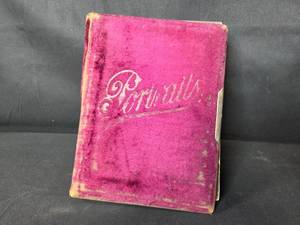 lot 32 image: Antique Velvet Portrait Album with 1800s MN Studio Photos