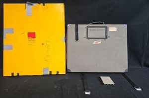 lot 39 image: Kodak Photographic Empty Paper Pack Box, Gray Art Portfolio Case, and Kodak Film Holder