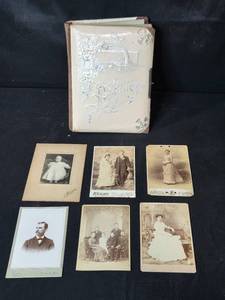 lot 41 image: Antique Photo Album with Minnesota Cabinet Card Portraits