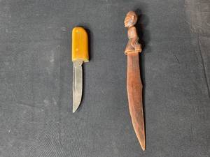 lot 42 image: Pair of Vintage Knives Including Carved Wooden African Knife and Utility Knife
