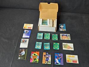 lot 47 image: Collection of Baseball and Football Trading Cards with Diamond King Puzzle Pieces