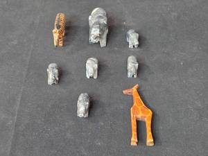 lot 110 image: Set of 7 Hand-Carved Animal Figurines Stone and Wood