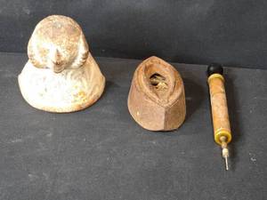 lot 140 image: Lot of 3 Antique Tools Iron Bull Head, Sad Iron, and Brass Pump