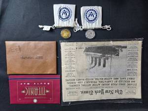 lot 164 image: RMS Titanic Commemorative Coin Set with Replica Newspaper, Map, and Document Holder