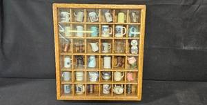 lot 168 image: Collection of Miniature Mugs and Steins in Oak Display Case