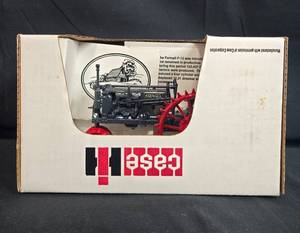 lot 192 image: Country Classic by Scale Models - Mcckormick - Deering Farmall F-12 116th Scale Tractor