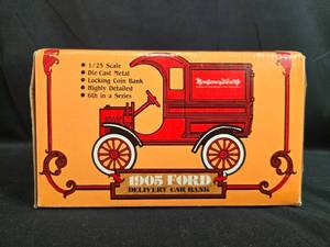 lot 197 image: ERTL 1905 Ford Die-Cast Delivery Car Bank with Montgomery Ward Co. Graphics