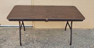 lot 227 image: Folding Utility Table with Wood Grain Finish 59x30 Inches