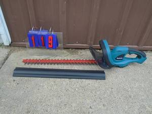 Makita 18 volt hedge trimmer 22. Trade show display.