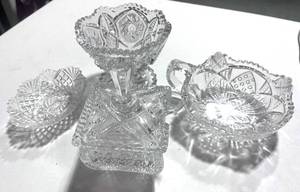 lot 67 image: Four Cut Glass Pieces Candy Dish, Sugar Bowl, Trinket Tray, Compote