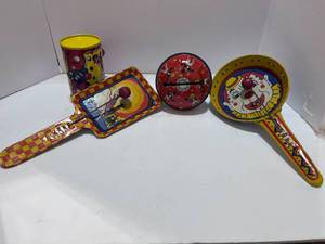 lot 100 image: Four Vintage Metal Noise Makers