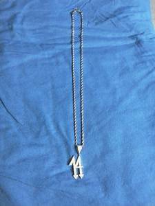 lot 90 image: Iced Out Number 14 Pendant Necklace
