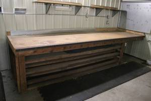 lot 2 image: Large Wooden Workbench with Storage Shelves