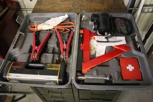 lot 32 image: Automotive Emergency Tool Set with Jumper Cables and Air Compressor