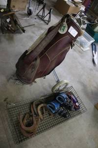 lot 57 image: Golf Bag with Clubs, Inline Skates, Horseshoes, Air Pump, and Practice Net