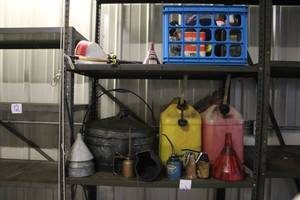 lot 84 image: Garage Lot with Gas Cans, Funnels, Oilers, Files and More