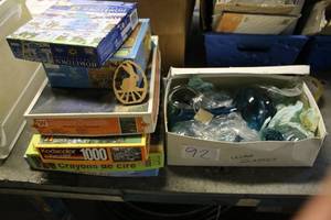 lot 92 image: Lot of Jigsaw Puzzles and Blue Glassware Collection