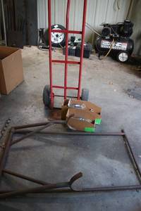 lot 111 image: Red Dolly with Metal Frame and Box of Zip Ties