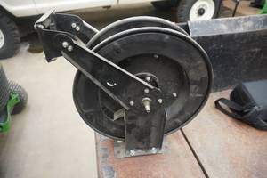 lot 18 image: Campbell Hausfeld Wall Mount Hose Reel