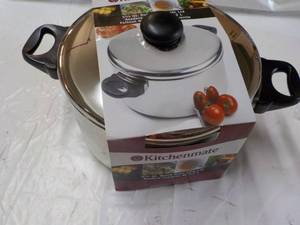 lot 310 image: KitchenMate 5 12 qt. Dutch Oven wi...