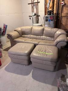lot 28 image: 3 Piece Leather Couch - 2 rolling foot stools