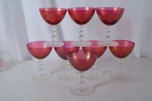 lot 43 image: Set of 8 Imperial Glass Ruby Red Glass Coupes - Clear Bubble Stems
