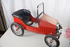 lot 71 image: 1938 Style Red Pedal Car with Black Seat and Chrome Accents