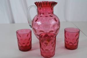 lot 80 image: Fenton Cranberry Glass Pitcher with Three Matching Tumblers