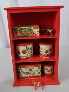lot 100 image: Vintage Red Painted Shelf with Strawberry-Themed Tins and Soap