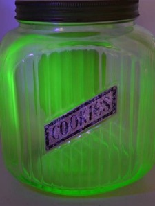 lot 120 image: Vintage Uranium Glass Cookie Jar with Arco Coffee Label