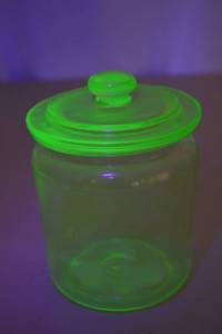 lot 129 image: Vintage Uranium Glass Canister Jar with Lid, Glows Under UV, 5 Inch