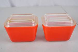 lot 141 image: Pair Vintage Pyrex Red Refrigerator Dishes with Lids