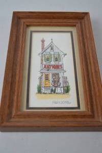 lot 209 image: Framed 1986 Signed Print - Antiques Store Illustration (Mason)