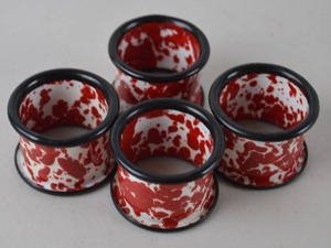 lot 220 image: Set of 4 Red and White Enamel Napkin Rings