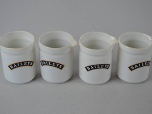 lot 221 image: Set of 4 Baileys Ceramic Creamer Pitchers