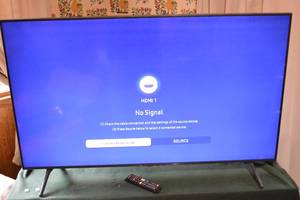 lot 301 image: Samsung UN50TU7000F 50-Inch 4K UHD Smart TV with Remote